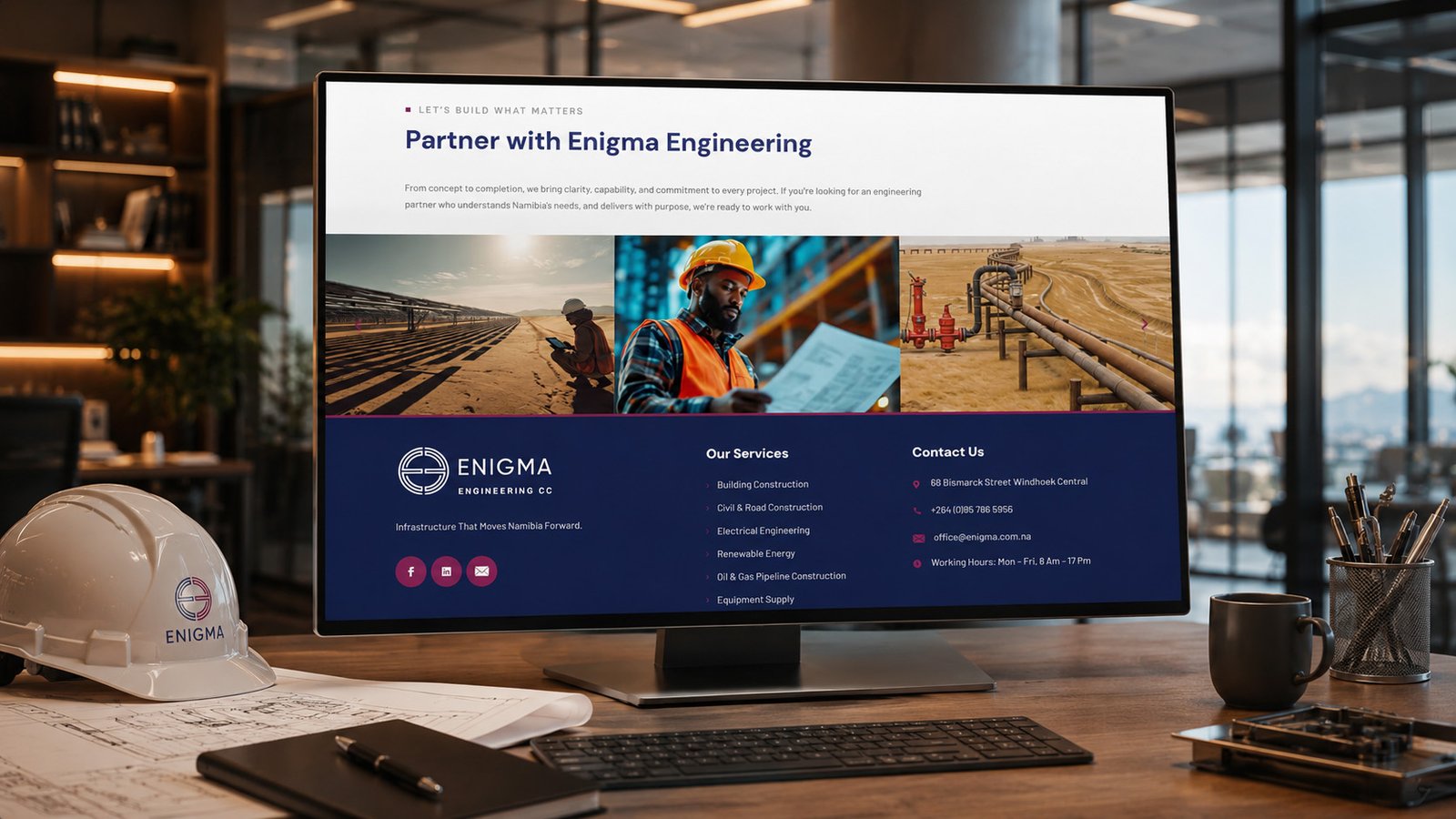 Engineering Website Design In Namibia showing Enigma Engineering partner section and services on desktop monitor