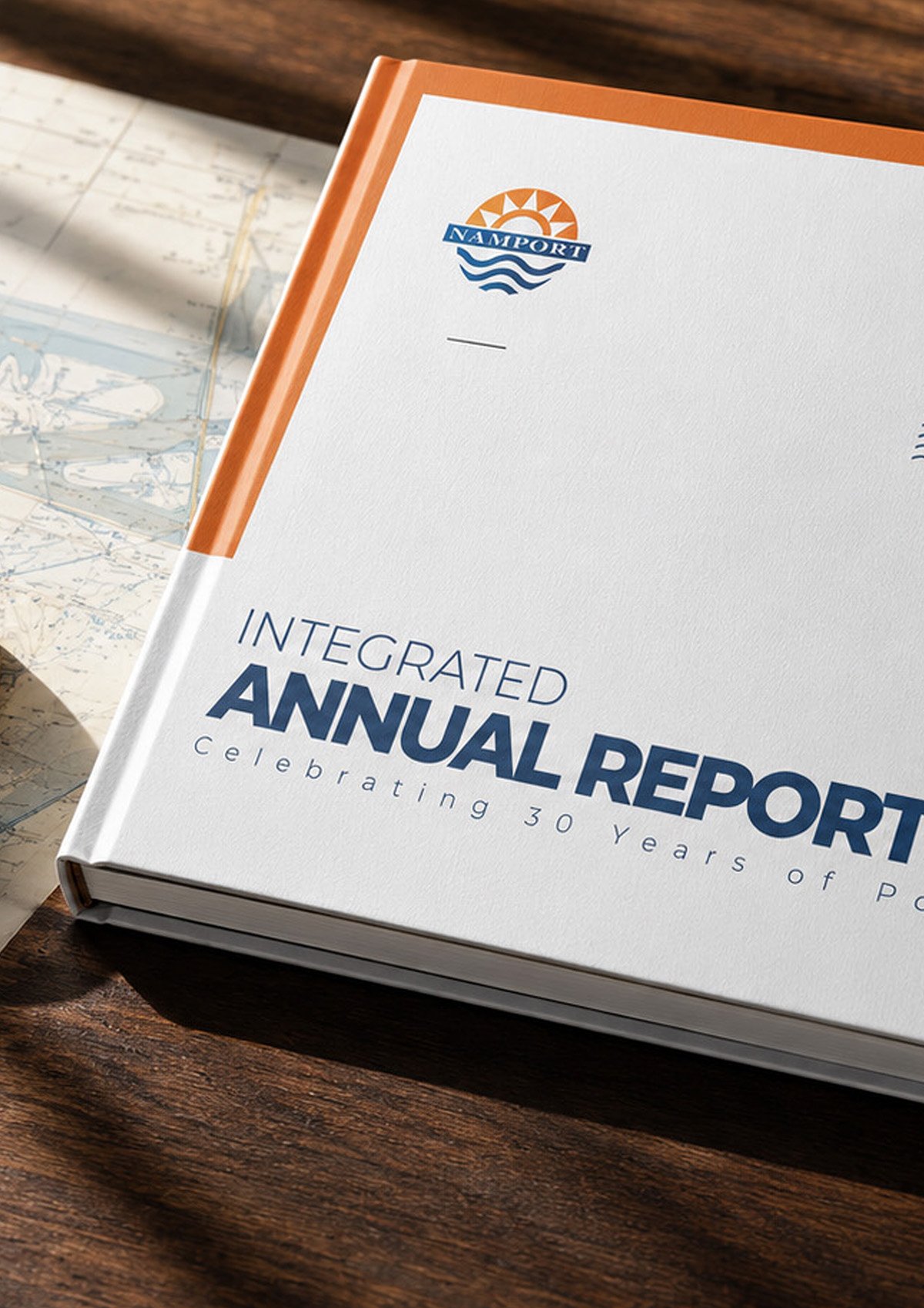 Namport integrated annual report design presented on a nautical desk